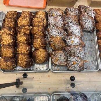 Radio Bakery - From left: Matcha Mango Morning Bun, Chocolate "Almond Joyful", Pistachio Croissant, Rhubarb & Custard. - Bakeries Near Me - Brooklyn, New York
