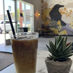 Cold latte with oat milk.