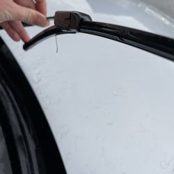 Budget/Avis Rent A Car - Windshield wiper with no blades.