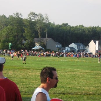MidSummer at the Meadows - a crowd of people playing frisbee - Music Venues Near Me - Milford, Ohio