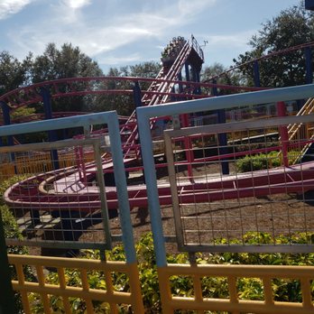Super Grover's Box Car Derby - It's a small roller coaster. - Amusement Parks Near Me - Orlando, Florida Super Grover's Box Car Derby - It's a small roller coaster. - Amusement Parks Near Me - Orlando, Florida