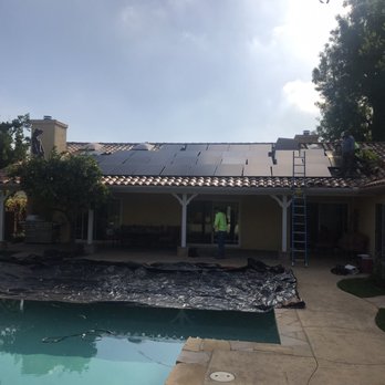 Green Convergence - Solar panels are carefully attached - Solar Installation Near Me - Valencia, California