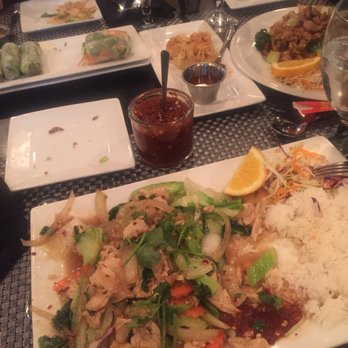 Tuptim Thai - Garlic Pepper with chicken, spring rolls, soya noodles and money bags. - Thai Near Me - Topeka, Kansas Tuptim Thai - Garlic Pepper with chicken, spring rolls, soya noodles and money bags. - Thai Near Me - Topeka, Kansas
