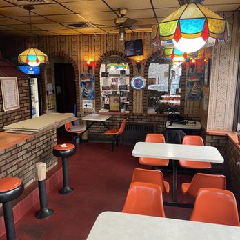 John's Pizzeria - Inside - Pizza Near Me - Elmhurst, New York