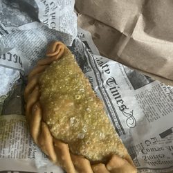 Beef Empana, they do have chicken or pizza. Like a small calzone?