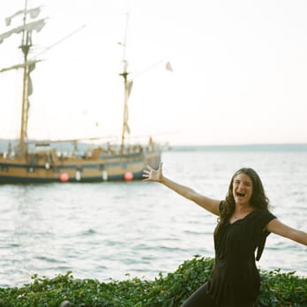 Jubilee Event Engineers - Featured in Seattle Bride...Kristen T having fun at Woodmark Hotel wedding with Tall Ships and cannons and a mock battle!!! - Wedding Planning Near Me