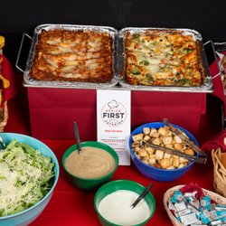 Office First Catering - Both of our four cheese lasagnas, layered with traditional meat.and garden vegetables, freshly baked.  Accompanied with a Caesar salad.