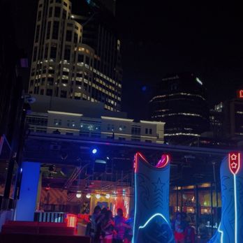 Play Playground - Rooftop bar has swings and outside seating. - Bars Near Me - Nashville, Tennessee