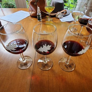 Leonard Oakes Estate Winery - four glasses of wine on a table - Wineries Near Me - Medina, New York