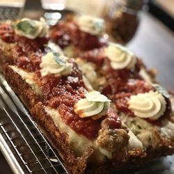 Black Cat Pizza - Margherita pizza with whipped ricotta, basil, and flavorful tomato sauce. Crispy crust. Added sausage to this. Decadent.