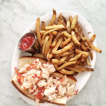 Neptune Oyster - Maine lobster roll with butter and fries - Seafood Near Me - Boston, Massachusetts