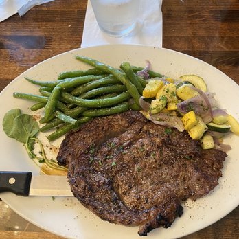 The Library Restaurant & Pub - 12 oz. Rib Eye sautéed green beans, squash medley. - Steakhouses Near Me - Indianapolis, Indiana The Library Restaurant & Pub - 12 oz. Rib Eye sautéed green beans, squash medley. - Steakhouses Near Me - Indianapolis, Indiana