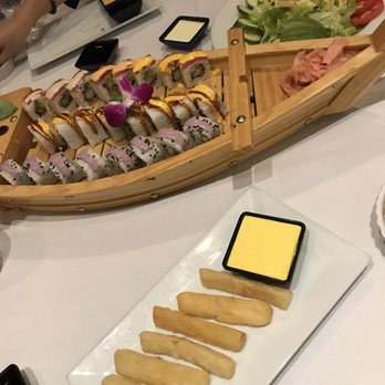 Ceviche Arigato - Sushi boat, yuca fried, avocado salad - Peruvian Near Me - Lake Park, Florida