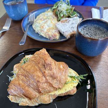 Bare Bistro- Fedora's Cakes & Bakes - Ham and cheddar omelette. Love the rocket too. Croissant breakfast sandwich. Rich. But worth it! - Cafes Near Me - Banff, Alberta Bare Bistro- Fedora's Cakes & Bakes - Ham and cheddar omelette. Love the rocket too. Croissant breakfast sandwich. Rich. But worth it! - Cafes Near Me - Banff, Alberta