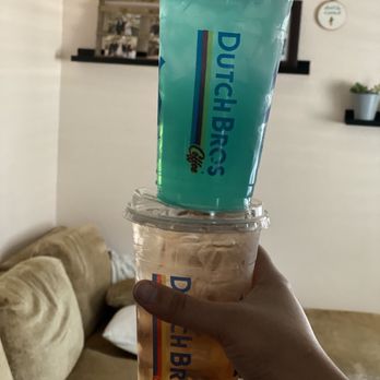 Dutch Bros Coffee - The wildly blue tropical iced tea on top and the peach tea on bottom - both delicious and both with Green Tea. - Coffee & Tea Near Me - Las Vegas, Nevada Dutch Bros Coffee - The wildly blue tropical iced tea on top and the peach tea on bottom - both delicious and both with Green Tea. - Coffee & Tea Near Me - Las Vegas, Nevada