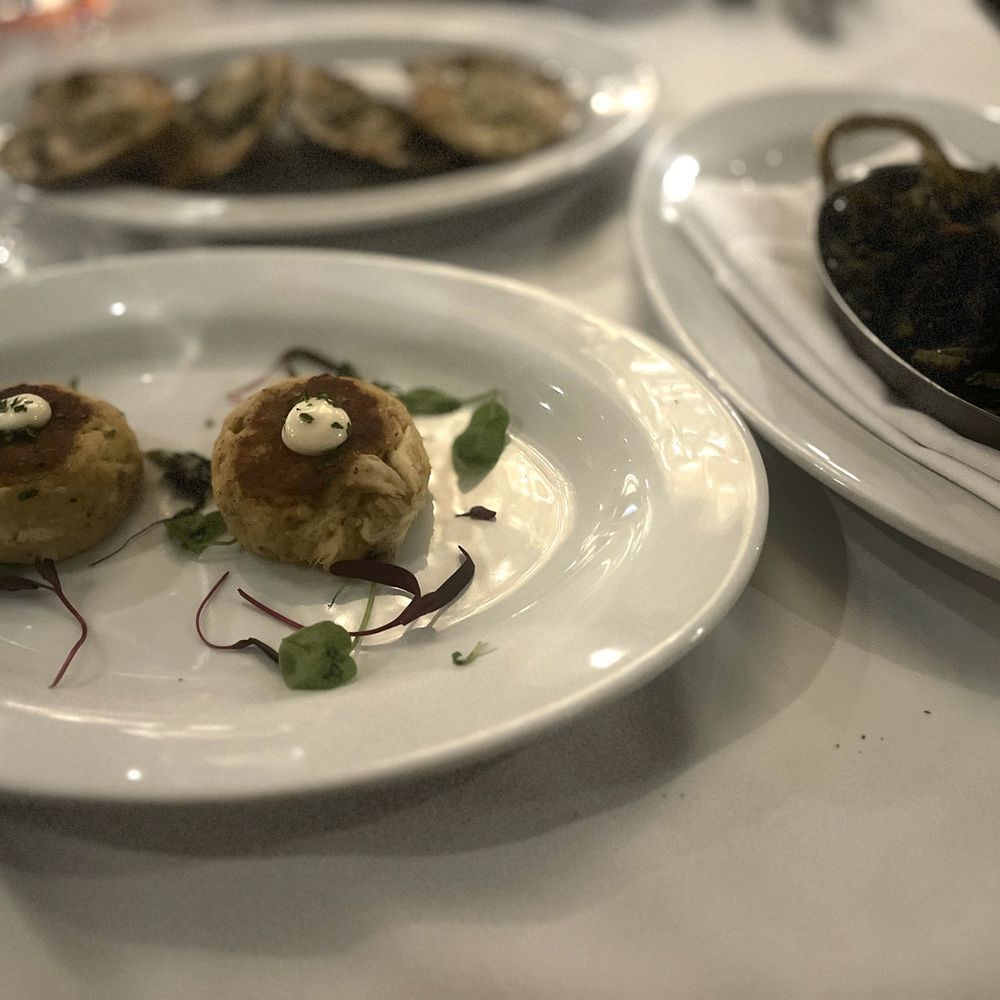 Crab cakes, Oysters Rockefeller and Collard Greens w/ turkey Crab cakes, Oysters Rockefeller and Collard Greens w/ turkey