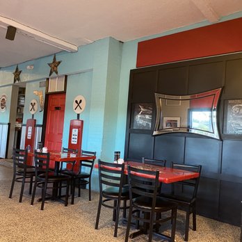 GAS- Full Service Restaurant - Part of the interior. So cute -- it looks just like a garage... - American Near Me - St. Augustine, Florida