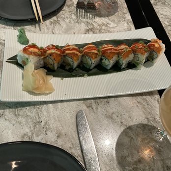 Blue Fin - a plate of sushi and a glass of wine - Sushi Bars Near Me - New York, New York