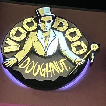 Voodoo Doughnut - Signage at the top of the donut shop. - Bakeries Near Me - Orlando, Florida Voodoo Doughnut - Signage at the top of the donut shop. - Bakeries Near Me - Orlando, Florida