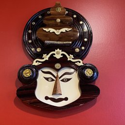 a mask on a wall