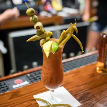 End Zone Sports Bar - a bloody drink on the bar - Sports Bars Near Me - Bossier City, Louisiana End Zone Sports Bar - a bloody drink on the bar - Sports Bars Near Me - Bossier City, Louisiana