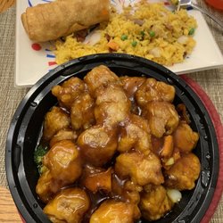 Asian Kitchen - Orange Chicken comes with steamed broccoli underneath, large egg rolls not too greasy, pork fried rice YUM