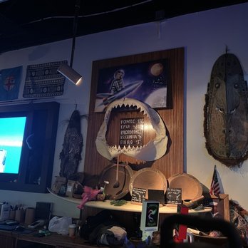 Purple Lotus Kava Bar - a television and a table - Lounges Near Me - Miami Beach, Florida Purple Lotus Kava Bar - a television and a table - Lounges Near Me - Miami Beach, Florida