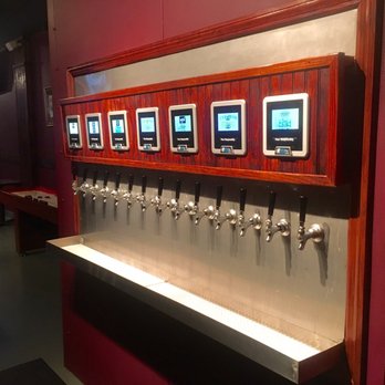 7th Hill Taproom - The self-serve tap. 2 beers per screen = 14 self-serve selections. Some kind of indicator for how old the keg is would be nice. - Beer Bar Near Me - Tallahassee, Florida 7th Hill Taproom - The self-serve tap. 2 beers per screen = 14 self-serve selections. Some kind of indicator for how old the keg is would be nice. - Beer Bar Near Me - Tallahassee, Florida