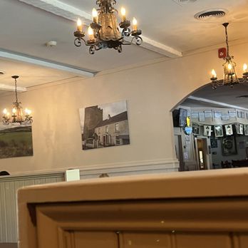 Murph's Hideaway - a chandelier hanging from the ceiling - Bars Near Me - Pocono Lake, Pennsylvania