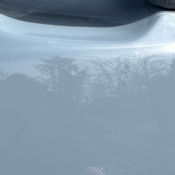 Ray's Auto Body - Bump that was the result of lazy prep work which led to dirt being painted over. There're 10+ along the door and fender just like this. - Body Shops Near Me - Vienna, Virginia Ray's Auto Body - Bump that was the result of lazy prep work which led to dirt being painted over. There're 10+ along the door and fender just like this. - Body Shops Near Me - Vienna, Virginia
