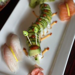 Umi Sushi - Red snapper nigiri, Caterpillar roll, and Salmon nigiri