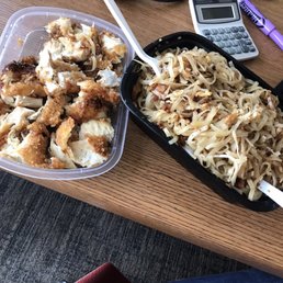Had to cut it separately. The take out container was jam packed. So good