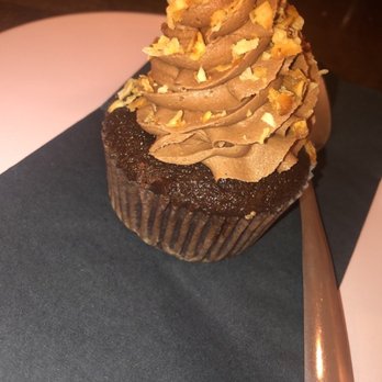Naked Cafe - Chocolate cupcake with toasted coconut  Lovely, moist and delicious - Cafes Near Me - Kelowna, British Columbia