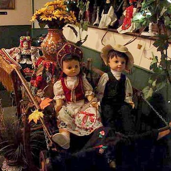 Hungarian Rhapsody - Goat (or dog?) cart driven by dolls wearing ethnic costumes. - Hungarian Near Me - Southgate, Michigan Hungarian Rhapsody - Goat (or dog?) cart driven by dolls wearing ethnic costumes. - Hungarian Near Me - Southgate, Michigan