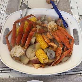 Outer Banks Boil Company - The 2 boils in our serving platter. There is a lot of food hidden under the top layer. - Seafood Near Me - Virginia Beach, Virginia