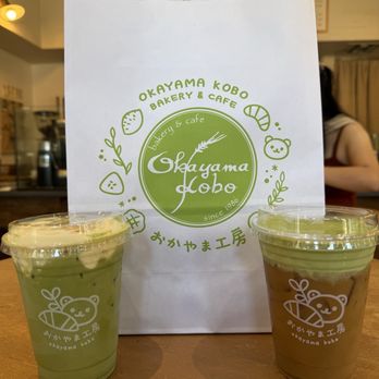Okayama Kobo Bakery & Cafe - Banana Creme Matcha Latte (left) Matcha Sea Salt Cold Brew (right) - Bakeries Near Me - Anaheim, California Okayama Kobo Bakery & Cafe - Banana Creme Matcha Latte (left) Matcha Sea Salt Cold Brew (right) - Bakeries Near Me - Anaheim, California
