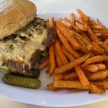 Upscale Rio - Green chile cheeseburger.  Add condiments to your liking $10 with fries $1 additional for sweet potato - Burgers Near Me - Rio Rancho, New Mexico