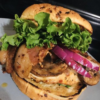 Three Georgie’s Diner - Grilled Chicken Sandwich. Lettuce, tomato, onions, red pepper aioli, grilled mushrooms, bacon on a onion roll. - Food Delivery Services Near Me Three Georgie’s Diner - Grilled Chicken Sandwich. Lettuce, tomato, onions, red pepper aioli, grilled mushrooms, bacon on a onion roll. - Food Delivery Services Near Me
