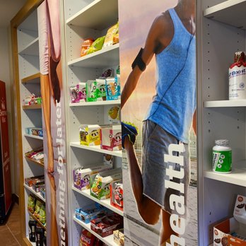 Smoothie King - a man in a blue tank top and shorts standing in front of a vending machine - Juice Bars & Smoothies Near Me - Fort Bliss, Texas Smoothie King - a man in a blue tank top and shorts standing in front of a vending machine - Juice Bars & Smoothies Near Me - Fort Bliss, Texas