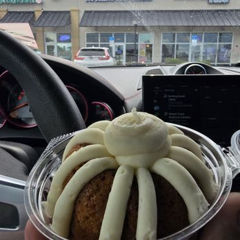 Nothing Bundt Cakes - Carrot Cake mini bundt in front of the store front. - Bakeries Near Me - Brooksville, Florida Nothing Bundt Cakes - Carrot Cake mini bundt in front of the store front. - Bakeries Near Me - Brooksville, Florida