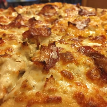 Bellacino's Pizza & Grinders - a close up of a pizza - Pizza Near Me - Simpsonville, South Carolina