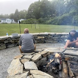 Glenmoor by the Sea - The fire pit is in the middle of the property so it's easy to access by people staying at the upper or lower cottages.