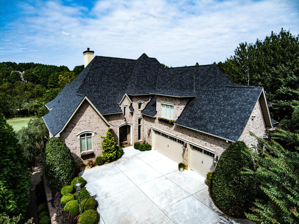 Slide of Guy Roofing