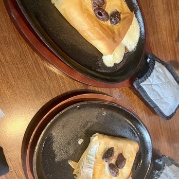 Rodos Greek Taverna - Baked feta and flaked saganaki - Modern European Near Me - Columbus, Ohio