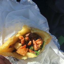 Carolina Empanada - Veggie empanada! And a chicken empanada!  Wrapped in tin foil and served in a to go box with a nice and spicy sauce!