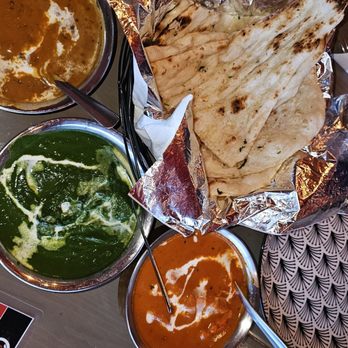 Mumbai Local - Black  lentils..  butter chicken..paneer spinach Naan.  We also had 2 rice and extra  butter. Chicken - Indian Near Me - Canmore, Alberta