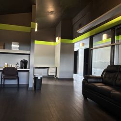 Blackout Tinting - They have an AMAZING waiting area with comfortable couches and desks for you to use a laptop or tablet on while you wait!