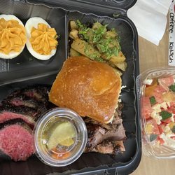 Silver and Sons BBQ - 2x2 platter: prime brisket, short rib pastrami, lemon schmaltz potatoes, smoked deviled eggs; watermelon salad.
