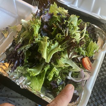 P J Marley's - Salad literally salad. You see those two onions and half a cherry tomato. And salad. - New American Near Me - Medina, Ohio