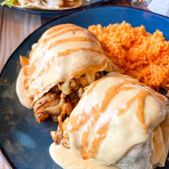 Taco Addicts - a plate of mexican food - Mexican Near Me - Cary, North Carolina